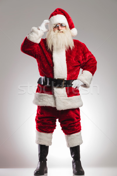 santa claus scratching his head and thinks  Stock photo © feedough