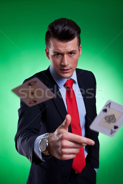 young business man throwing the winning hand  Stock photo © feedough