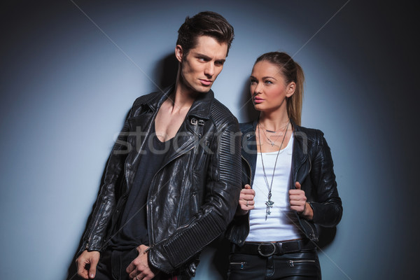 biker pose looking away while his woman is starring at him Stock photo © feedough