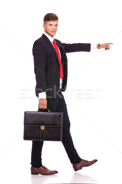 business man walking & pointing Stock photo © feedough