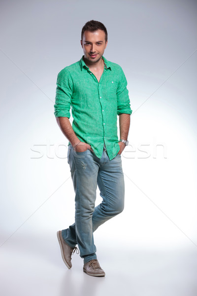 casual man stands with hands in pockets Stock photo © feedough