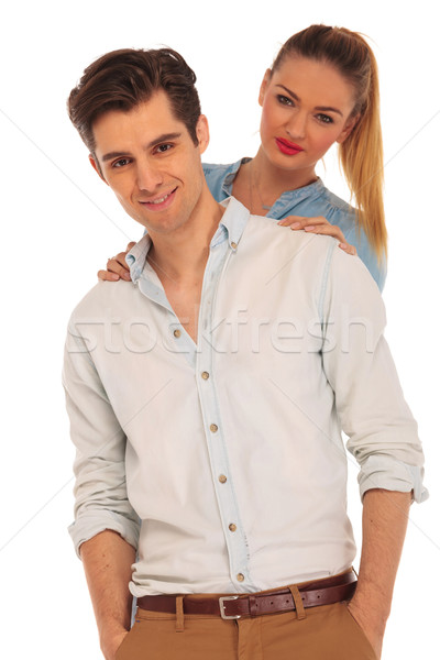 boy posing while girlfriend is holding him Stock photo © feedough