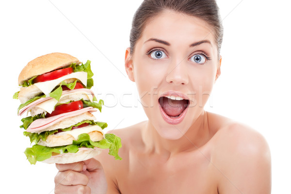 Delicioso mulher jovem surpreendido tamanho sanduíche mulher Foto stock © feedough