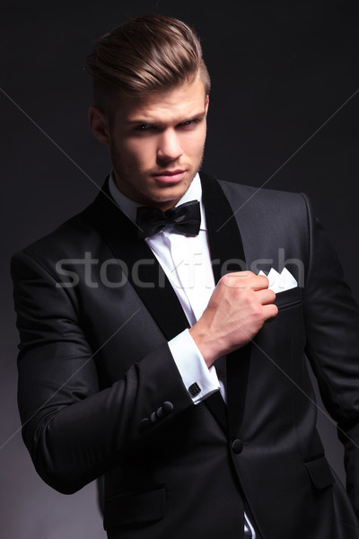 business man holds his pocket handkerchief Stock photo © feedough