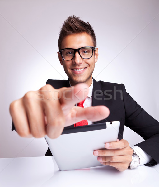  man choosing you while reading on a pad Stock photo © feedough