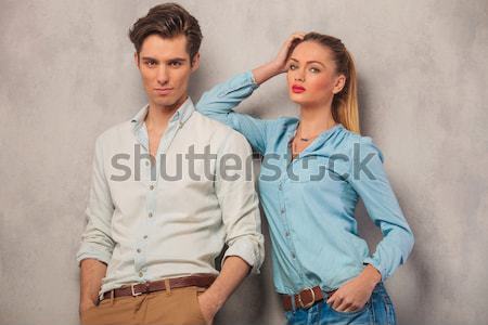 Couple cuir vêtements permanent mode regarder Photo stock © feedough