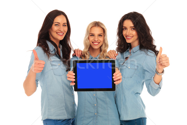 3 women showing the screen of  tablet and make ok  Stock photo © feedough