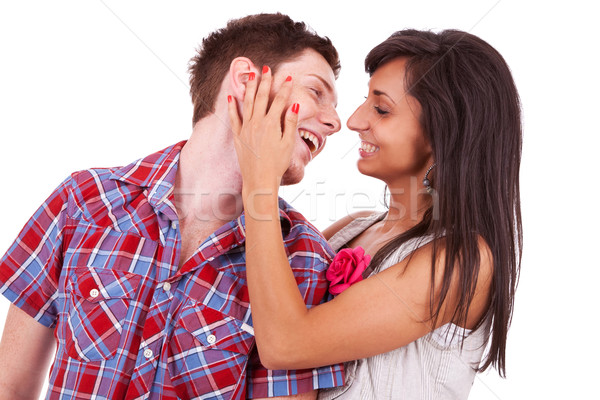 young couple smiling and preparing to kiss Stock photo © feedough