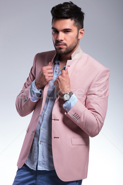 casual man with both hands on lapels Stock photo © feedough