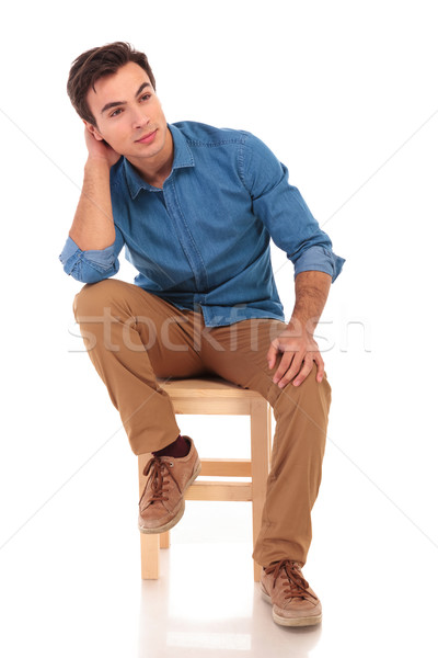 full body picture of a seated casual man dreaming  Stock photo © feedough