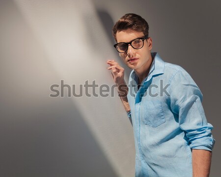 pensive man making a stupid face and looks to side Stock photo © feedough