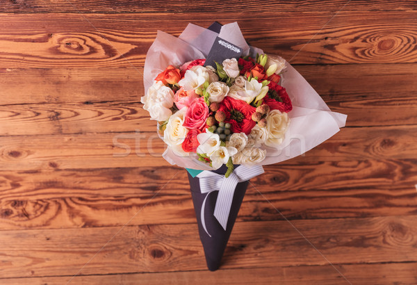 colorfull flowers bouquet in a cone with card and bow  Stock photo © feedough