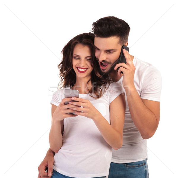 woman showing her message and the man looks very surprised  Stock photo © feedough