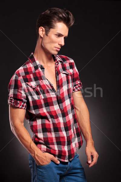 Stock photo:  pensive fashion model posing and looking away