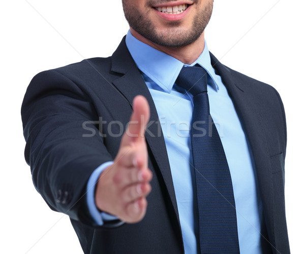  smiling business man ready to seal the deal Stock photo © feedough