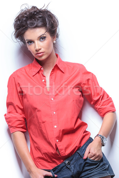 serious young woman with hands in pockets Stock photo © feedough