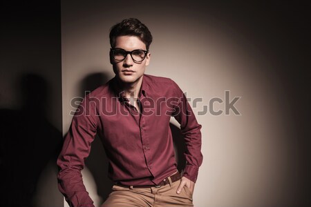attractive sexy man wearing sunglasses and yellow shirt Stock photo © feedough