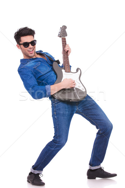Jeunes cool guitariste jouer guitare électrique blanche Photo stock © feedough