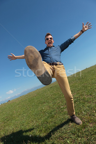 casual man balancing outdoors Stock photo © feedough