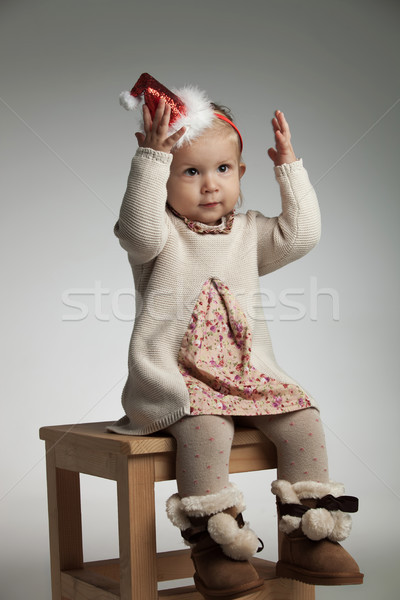 Fille chapeau séance mains [[stock_photo]] © feedough