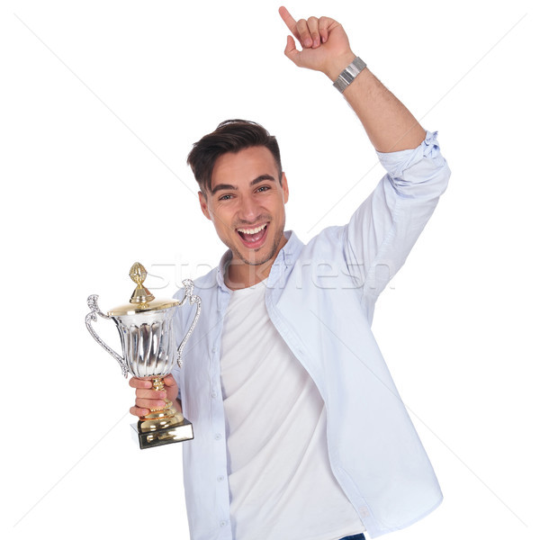 Stockfoto: Opgewonden · jonge · toevallig · man · trofee