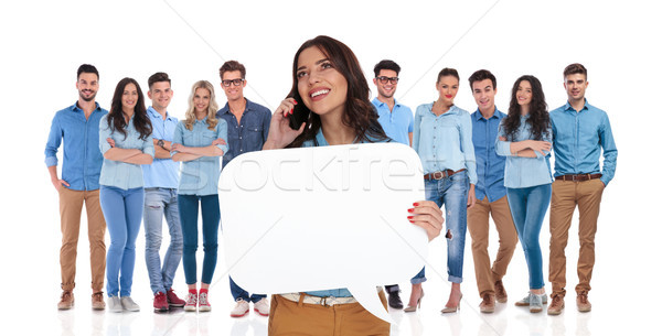 woman leader holding speech bubble while speaking on the phone Stock photo © feedough