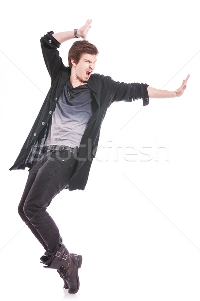 Dançarina na ponta dos pés pose jovem masculino Foto stock © feedough