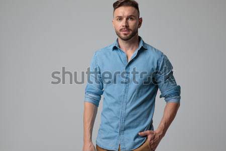 casual young man in polo shirt is thinking Stock photo © feedough
