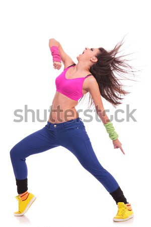 Dansator pasionat dans pune femeie frumoasa gri Imagine de stoc © feedough