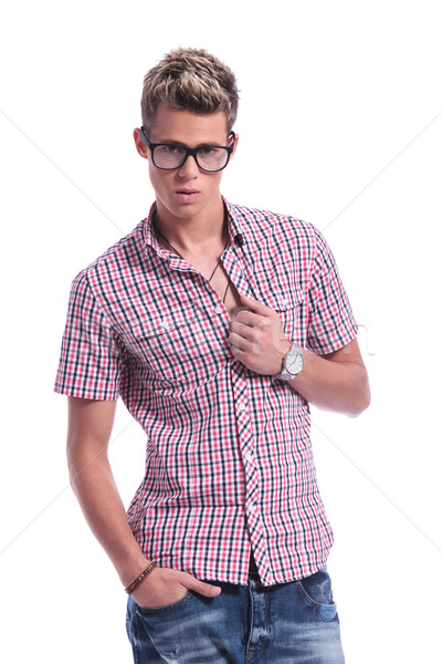 Stock photo: casual man unbuttoning shirt
