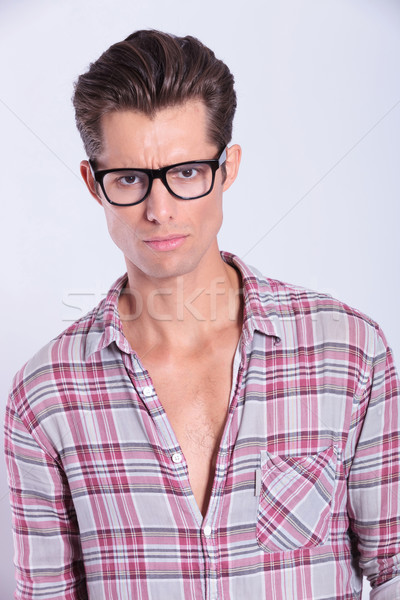 Stock photo: casual man looking at you with sadness