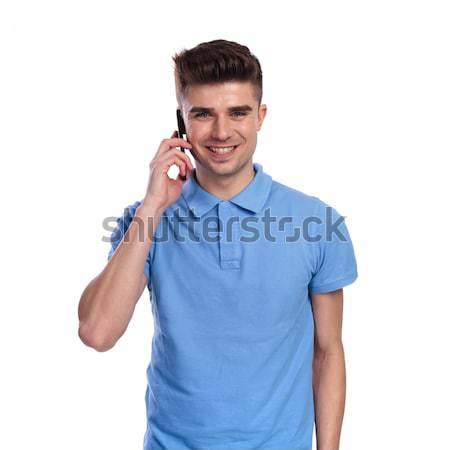 man in blue shirt talking on the phone Stock photo © feedough