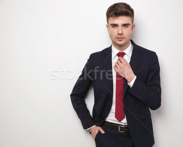 Jóképű nyugodt üzletember megjavít piros nyakkendő Stock fotó © feedough