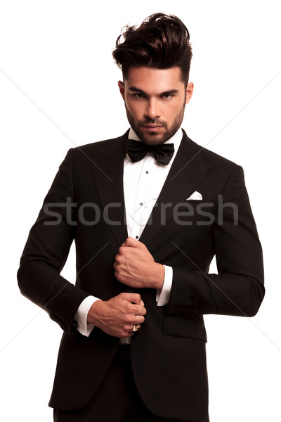 stylish man in elegant black suit and bowtie  Stock photo © feedough