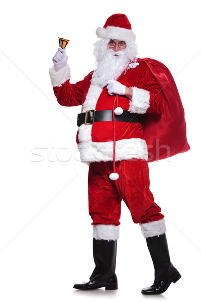 full body picture of santa claus sounding his bell Stock photo © feedough