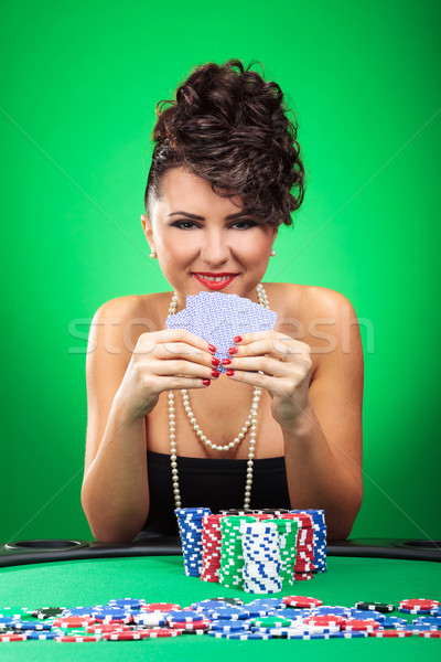 woman stays at poker table Stock photo © feedough