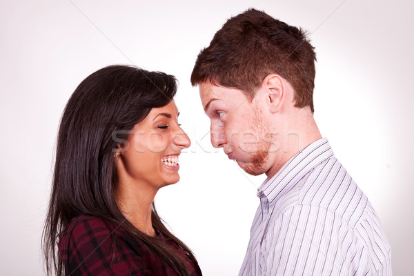 a young couple, man entertaining his girlfriend Stock photo © feedough