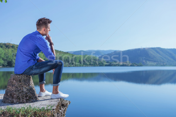pensive man by the lake Stock photo © feedough