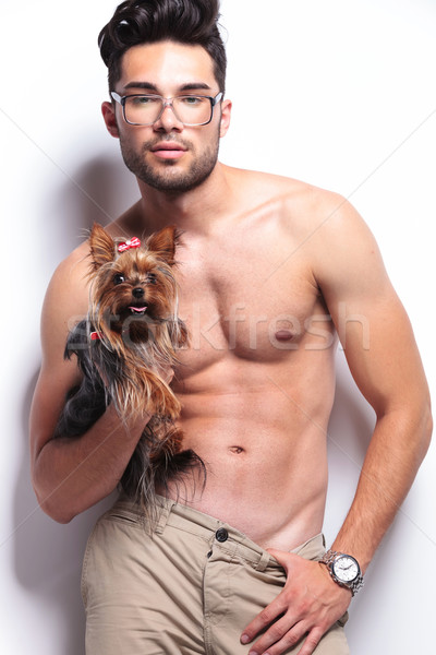 topless young man poses with puppy Stock photo © feedough