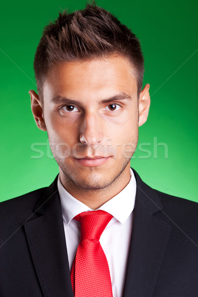 Portrait of a young handsome business man Stock photo © feedough