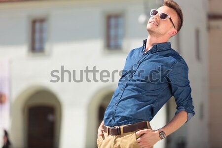 casual man sun bathes Stock photo © feedough