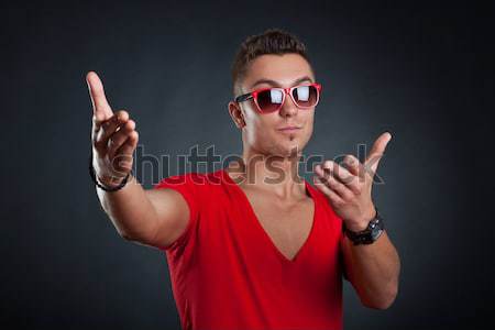 man showing framing hand gesture Stock photo © feedough