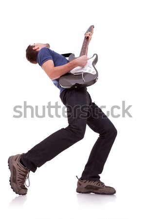 Grand angle jeunes guitariste jouer blanche mode [[stock_photo]] © feedough