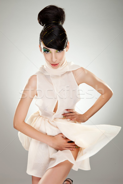 surprised attractive woman in a dress Stock photo © feedough