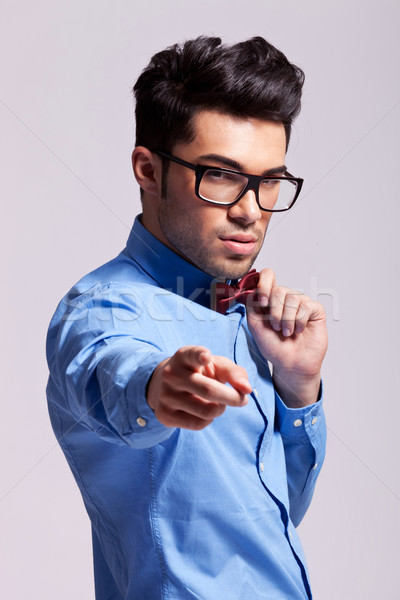 man wearing  bow tie pointing to the camera Stock photo © feedough