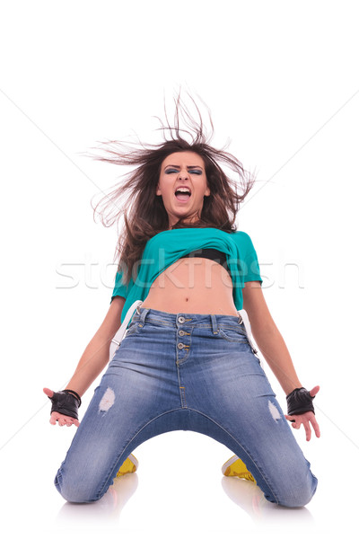 woman dancer on her knees, shouting Stock photo © feedough