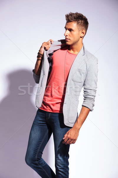 casual man pulling his jacket Stock photo © feedough