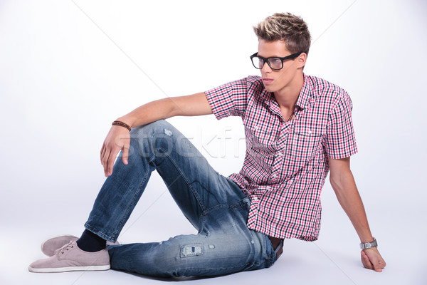 casual man sitting & looking away Stock photo © feedough