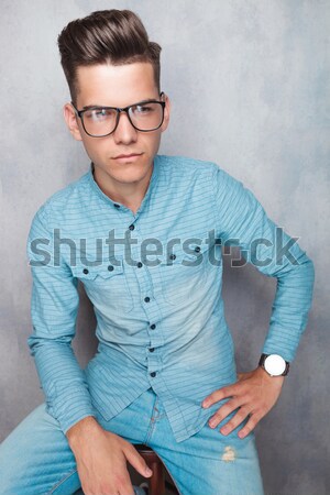 casual man looks at you with both hands in pockets Stock photo © feedough