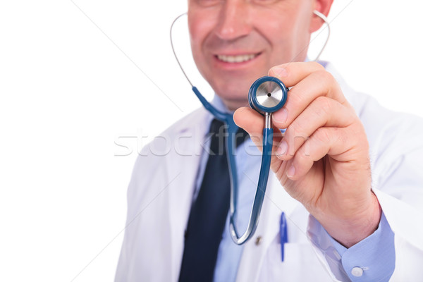closeup picture of an old doctor consulting you Stock photo © feedough